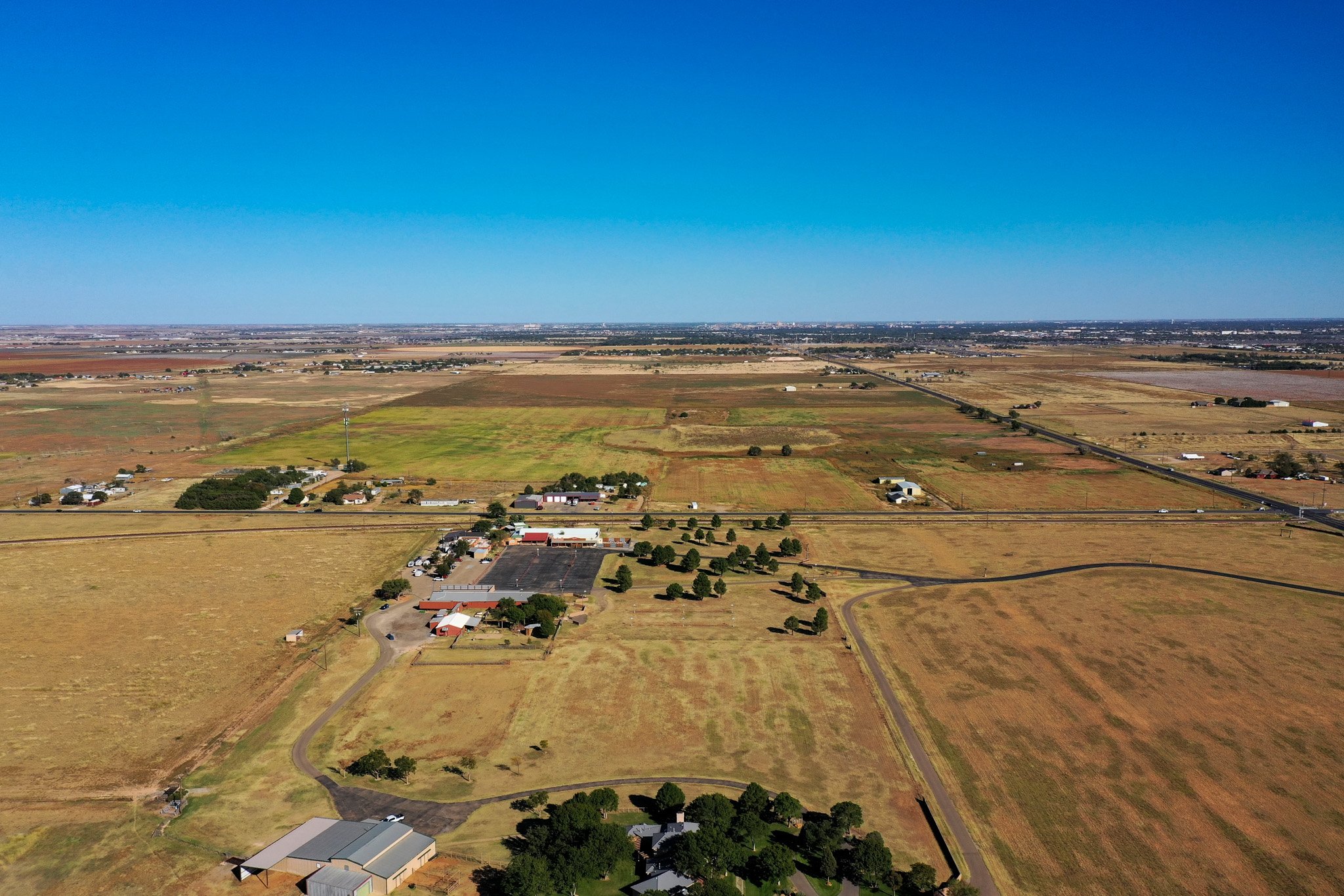 Aerial view of the 3.5 acre commercial corner and the surrounding acreage in West Lubbock, TX